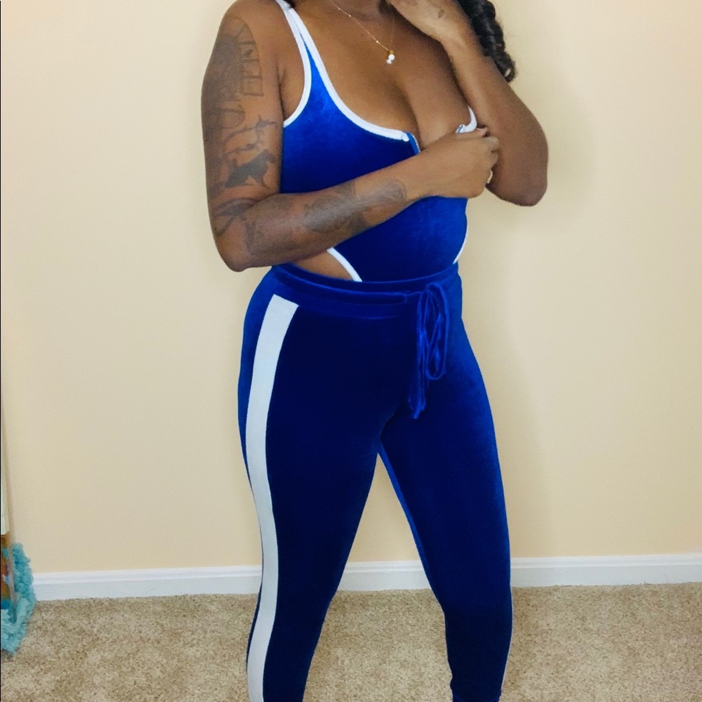 2-piece blue velour tracksuit.